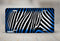 Airstrike® 607-"Blue Ringer Zebra Print" Zebra Background License Plate